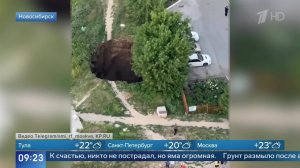 Огромная яма образовалась у многоэтажки в Новосибирске из-за обвала грунта: кадры.