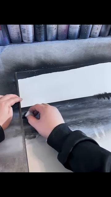 Couple Spray Painting Under The Night Sky