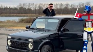 Робот за рулём Нивы бездорожье