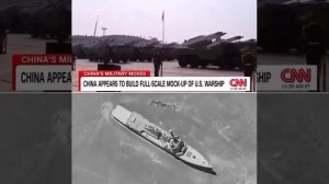 Китайцы в пустыне строят модельки американских авианосцев на рельсах в натуральную величину и катают