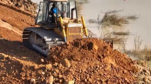 Massive Project DumpTruck  pushing Land With Bulldozer to build  New Road across the big pond