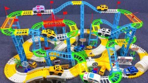 Играем в Игрушки с гоночным треком! Распаковка и Обзор ярких игрушек! Мультики для детей смотреть!