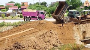 Строительство, засыпка водного канала