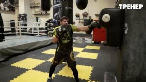 Как_бить_левый_боковой_Постановка_удара_на_боксерском_мешке