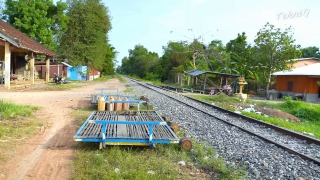 Riding A Cheap Bamboo Train Until A Big Train Comes