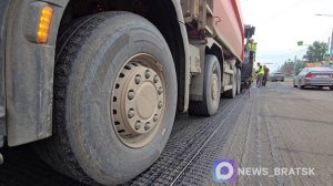 На улице Янгеля подрядчик приступил к укладке асфальтобетонного покрытия