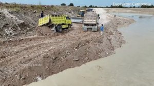 Dump Truck Delivery Soil Slip Fail On Steep Slope Pull Recovery By Dump Truck And Skills Heavy Dozer