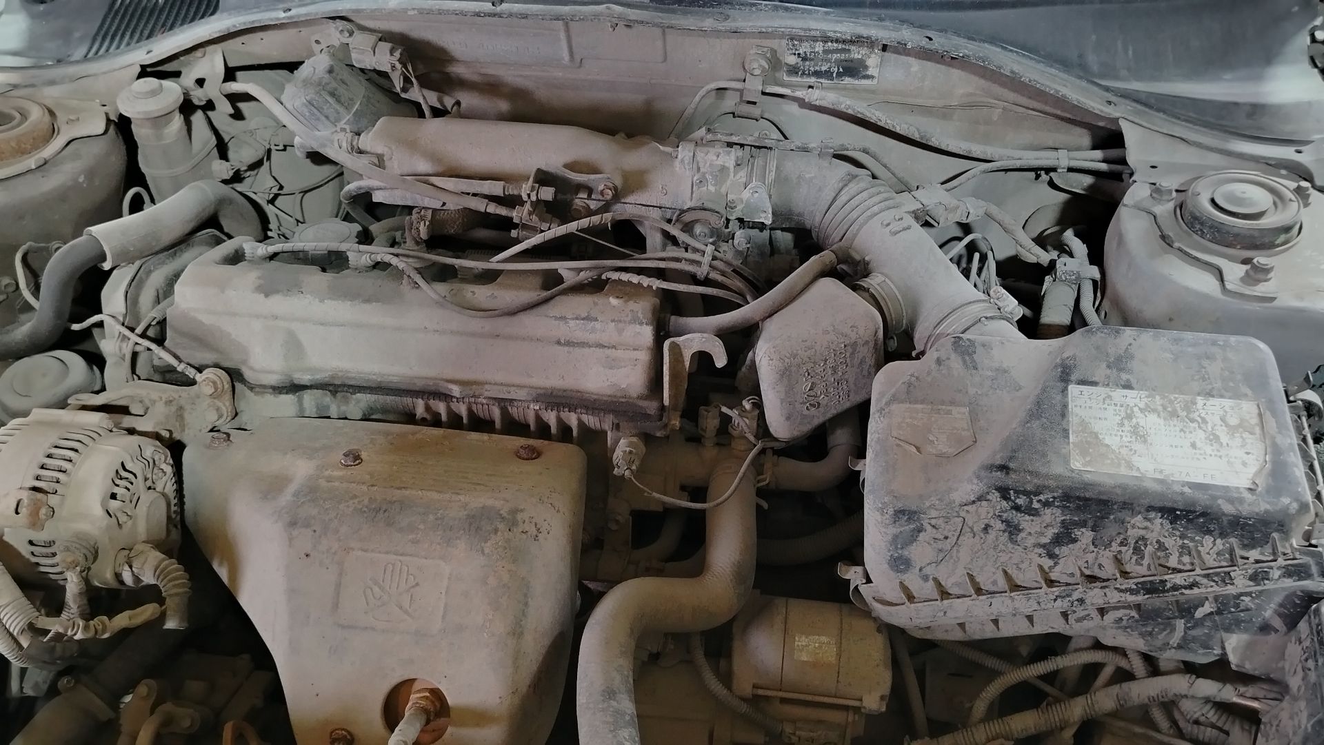 Где находится код краски Toyota Caldina