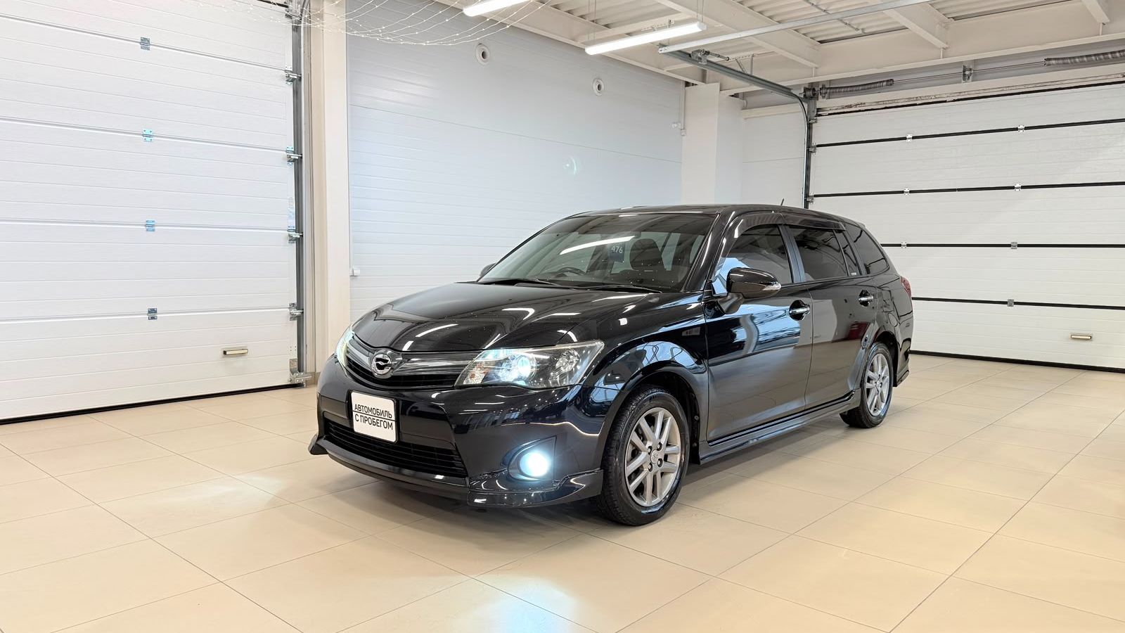 Toyota Corolla Fielder 2014 год