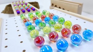 Различные деревянные трассы HABA Wave Slope и Marble Pack Rail, маленький пруд