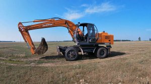 Еду на полноповоротном колёсном экскаваторе ЕК-18 UGM E185W