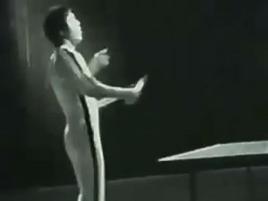 Bruce Lee Plays Ping Pong With Num Chucks