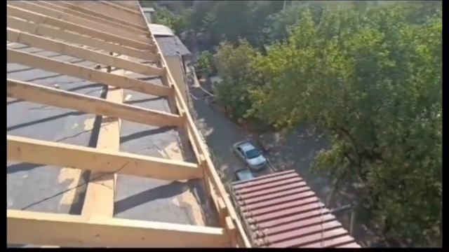 Работы по замене кровельного покрытия в  многоквартирном доме № 28 по проспекту Гамидова