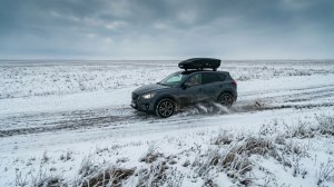 Сar is driving in the snow