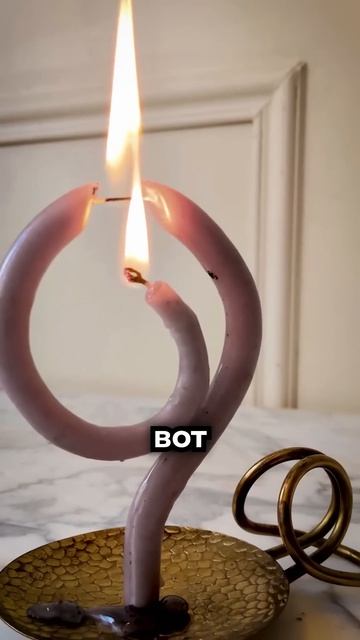Почему эта свеча не падает