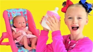 Baby doll wants to eat. Polina takes care of the toy doll