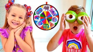 Диана и Рома играют в Волшебное колесо & Сюрпризы ЛОЛ