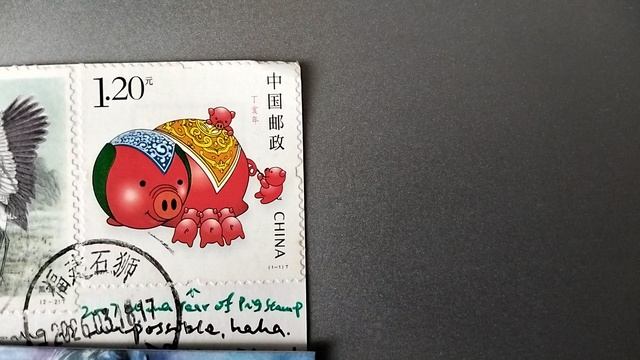 Год свиньи—китайский новый год на почтовой марке и открытке.