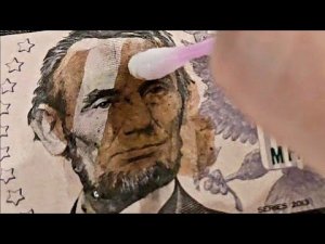 Удаление любого чернила с долларовой купюры. removing any ink from a dollar bill