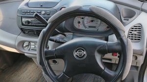 Где находится код краски кузова Nissan Tino