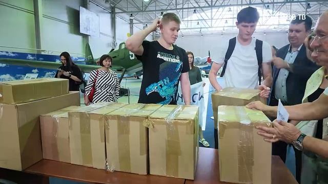 Из Королёва — в Мариуполь: сотрудники «НПО ИТ» собрали более 500 книг для школьников
