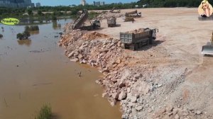 Строительство, засыпка водного канала
