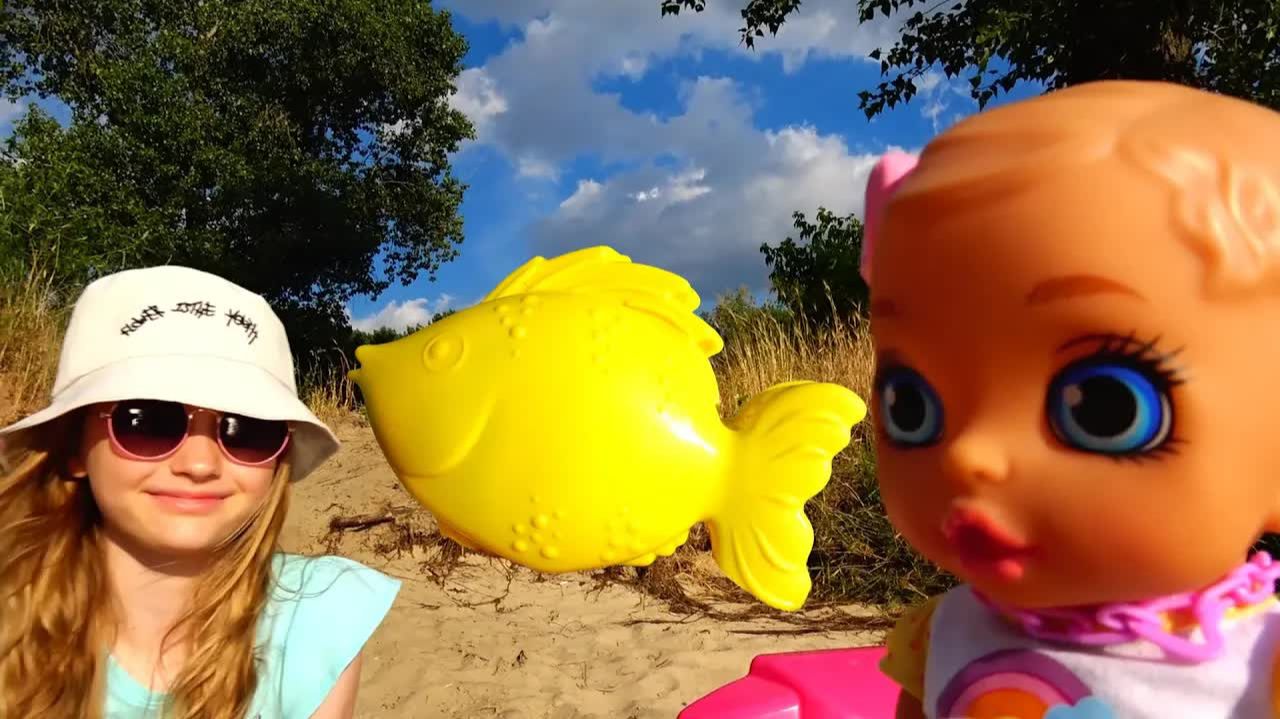 Polina Funny Playing On The Beach With Sand Molds And Dolls.