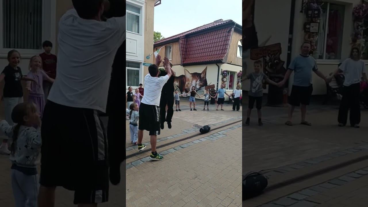 Брейк-дансеры со зрителями запускают волну на Курортном проспекте Зеленоградска. 17 июля 2026