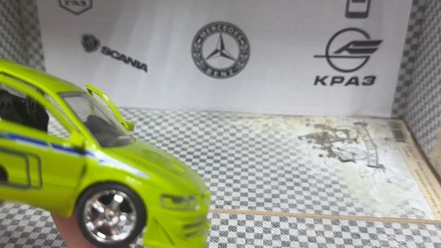 Распаковка и обзор моделей Mitsubishi Lancer Evo 7 и Lancer Evo 9