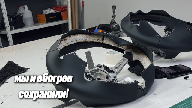Перетяжка руля BMW X6 натуральной кожей с красной строчкой