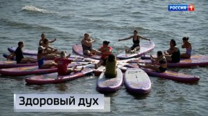 В Мариуполе проводят утренние тренировки по фитнесу на сапбордах