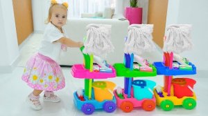 Алиса помогает няне и играет с игрушками для уборки