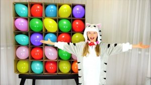 Polina is looking for surprises in balloons