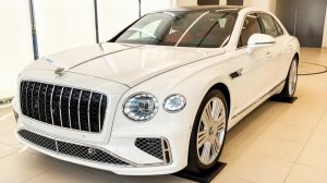 Bentley Flying Spur 2026 года отличный дорогой седан в белом цвете. Обзор автомобилей