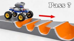 Как далеко проедет машинка LEGO по лежачим полицейским в обратном направлении