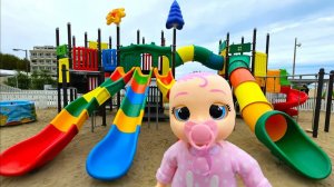 Cry Babies doll have a fun on the playground