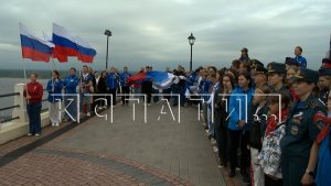 В преддверии Дня российского флага в центре Нижнего Новгорода прошло масштабное шествие