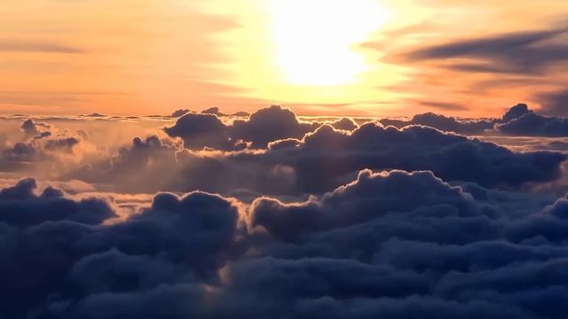 Sunrise Above The Clouds - Timelapse