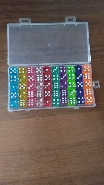 Собрала пятнашки из 50 игральных кубиков