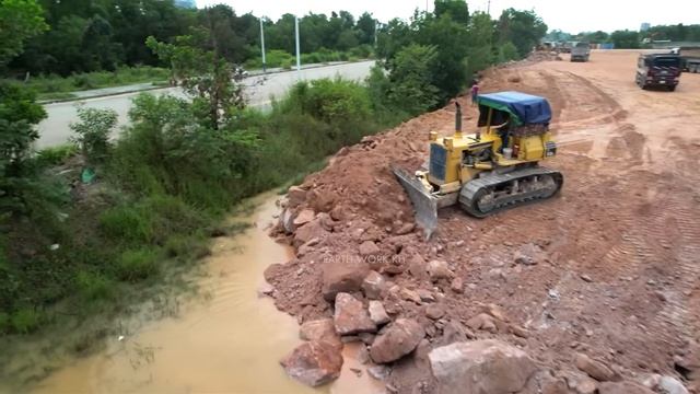 WOW!! Incredible Mighty Dump Trucks Teamworks Dumping Large Stones Fill in Lowland Area