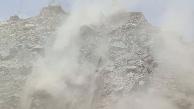 Miners' Action of Hitting the Clifftop During the Daytime