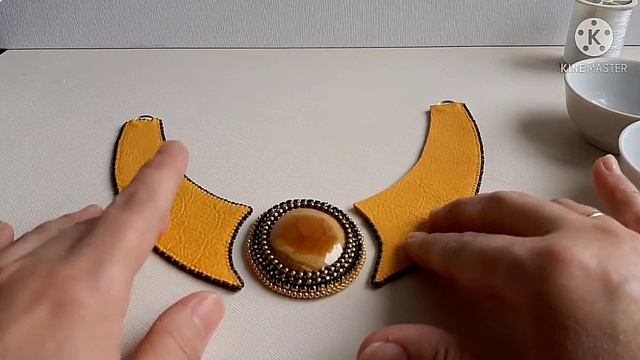 кулон из кожи и симбирцыта