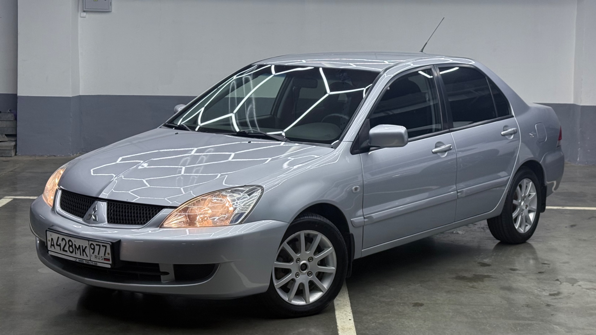 Mitsubishi Lancer 1.6 AT 2006  180 550 км