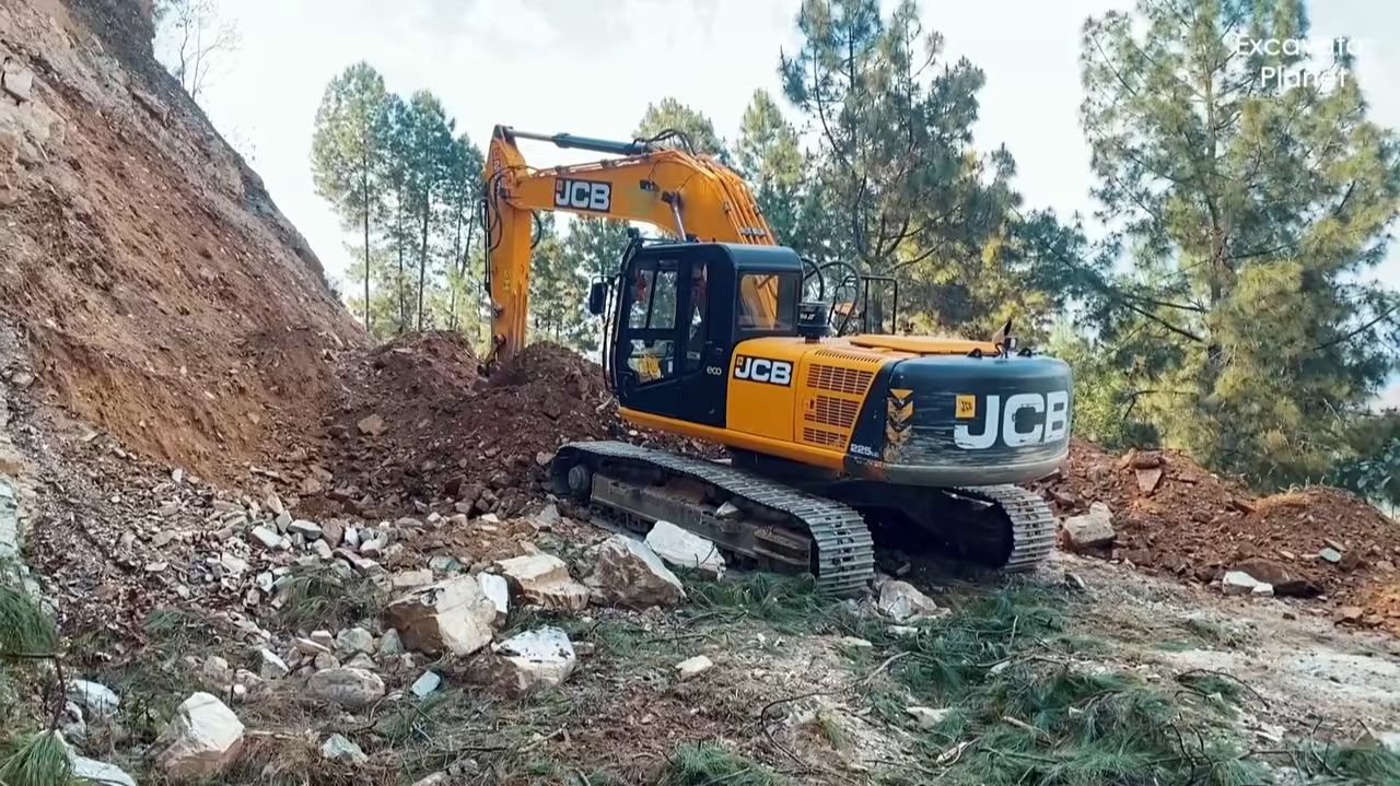 JCB Excavator On Mountain Road Construction