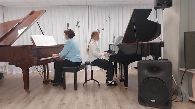 С.Колган 