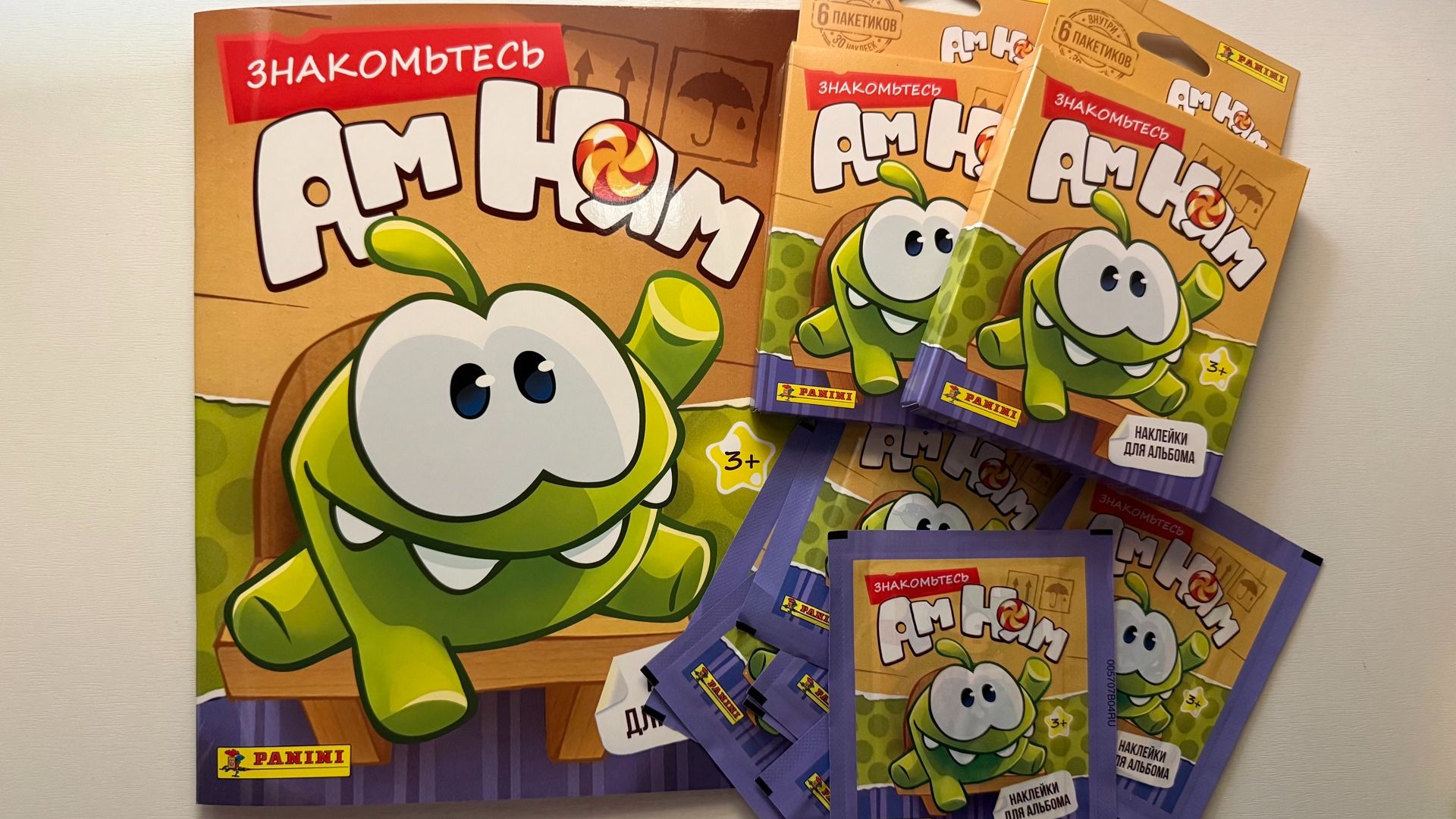Альбомы и наклейки PANINI