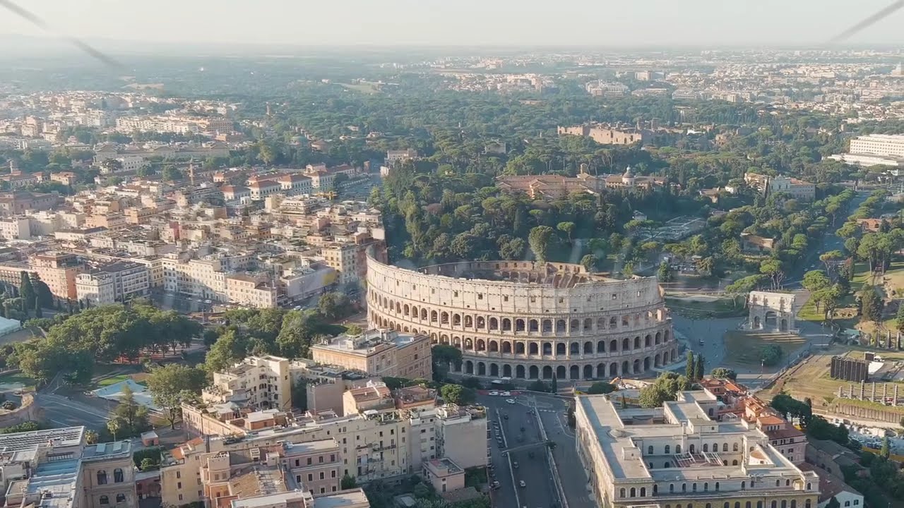Dolly Zoom. Rome, Italy. Roman Coliseum. Flight Over The City. Panorama Of The City In The Mornin...