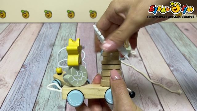 Игрушка паровозик-каталка Lanson Toys деревянная развивающая с разноцветными фигурками - видео