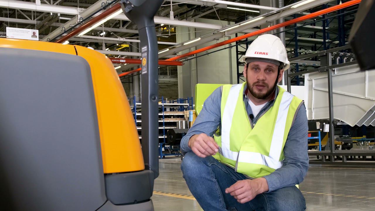 Самоходный штабелер Jungheinrich EJC B20 с захватом для колес