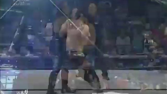 Undertaker gives Chokeslam to Gregory Helms.mp4 смотреть онлайн